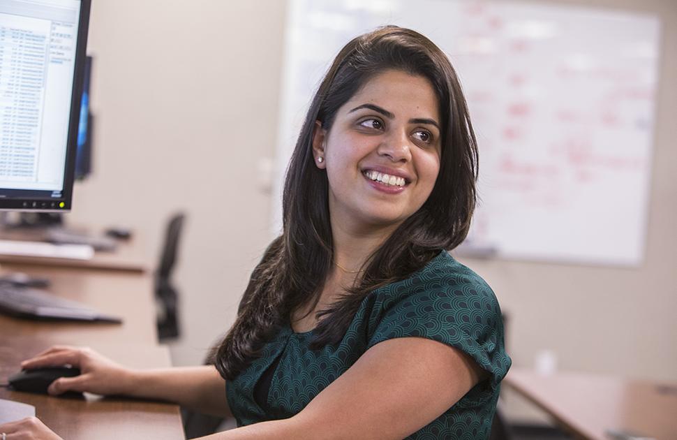 Female yd7610 Information Systems employee