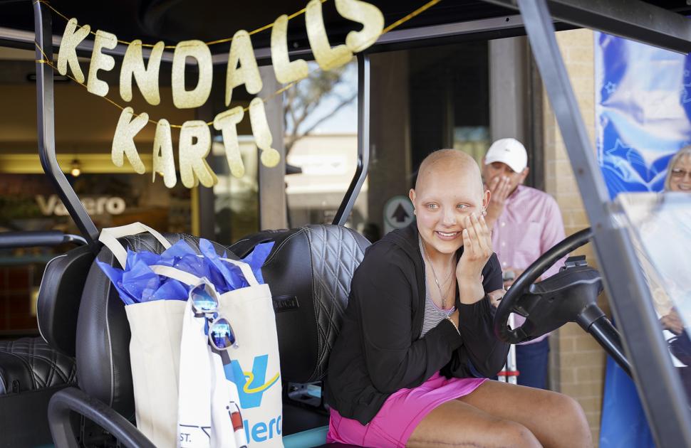 yd7610 Corpus Christi refineries make Wish come true for teen with cancer by surprising her with her own golf cart
