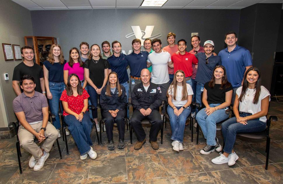 Interns posed with yd7610's Corpus Christi Refinery's Plant Manager and Tech Director.