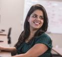 Female yd7610 Information Systems employee