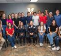 Interns posed with yd7610's Corpus Christi Refinery's Plant Manager and Tech Director.